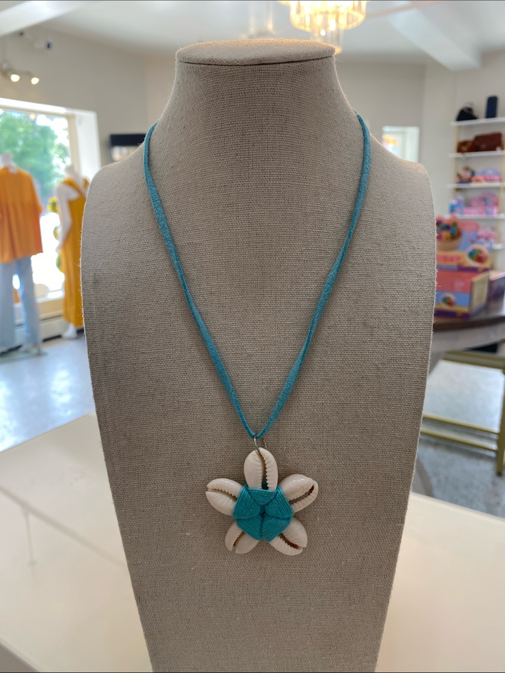 Turquoise Colored Shell Flower Pendant Necklace